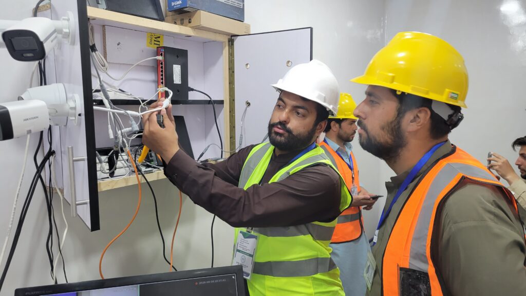 Instructor setting up DVR in CCTV Lab